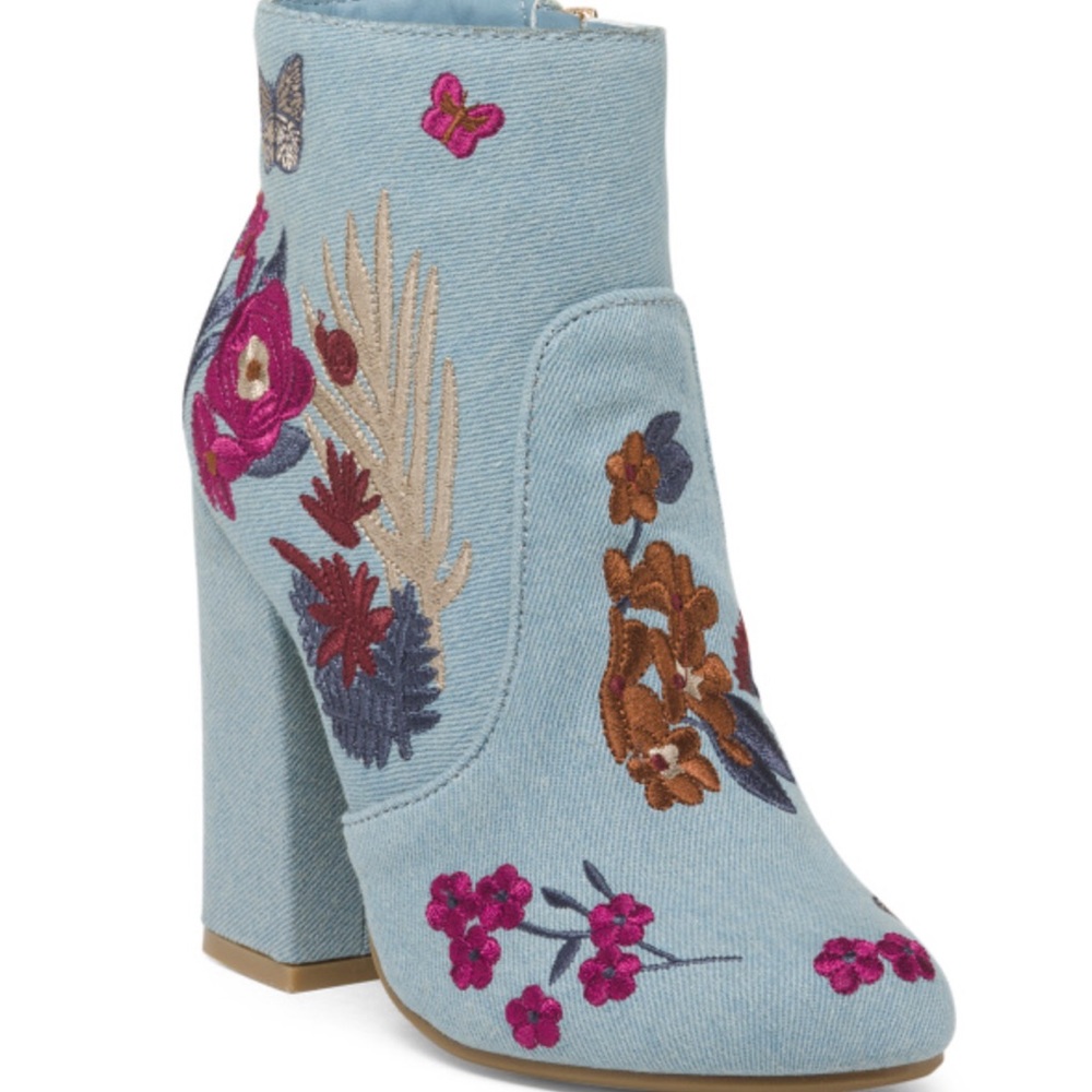 Denim bamboo booties with floral design. Size 8. Zip closure with 3” heels.